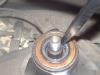 You may be able to remove the seal with a flat-bladed screwdriver, but be very careful not to damage the pinion shaft in doing so.