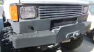 This is an '85 4Runner with aftermarket winch bumper, a Stull grill insert with a 3